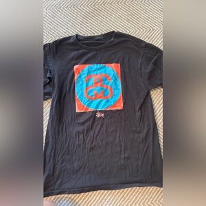 Stussy Black Tee with Blue and Red Graphic